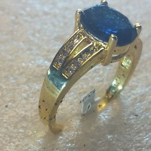 Blue sapphire and cubic ring in gold